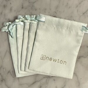 Five enewton bracelet bags.